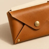 Envelope, close-up of the rivet and folded edge