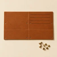 Folio unfolded flat, showing the die-cut blank
