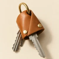 Hood Key Cover, close-up of the rivet and folded edge
