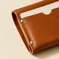 Ledger, close-up of the rivet and folded edge
