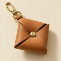 Pinwheel Charm, close-up of the rivet and folded edge