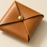 Pinwheel Coin Purse, close-up of the rivet and folded edge