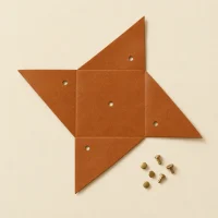Pinwheel unfolded flat, showing the die-cut blank