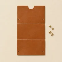 Pleat Mini unfolded flat, showing the die-cut blank