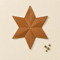 Fold Star Charm unfolded flat, showing the die-cut blank