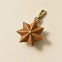 Fold Star Charm, folded, studio photo