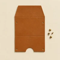Trine unfolded flat, showing the die-cut blank