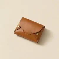 Tuck Coin Purse, folded, studio photo