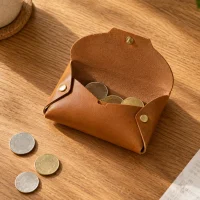 Tuck Coin Purse in use
