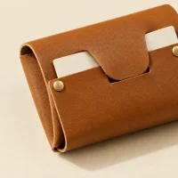 Tuck, close-up of the rivet and folded edge